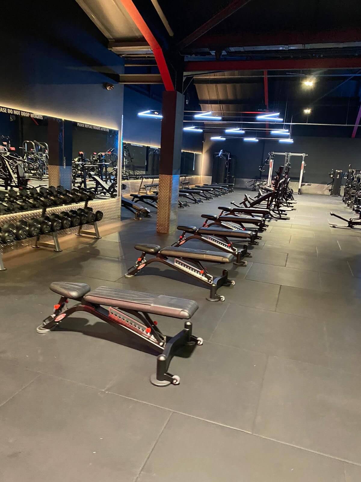 Specialist black flooring installed in a commercial gym